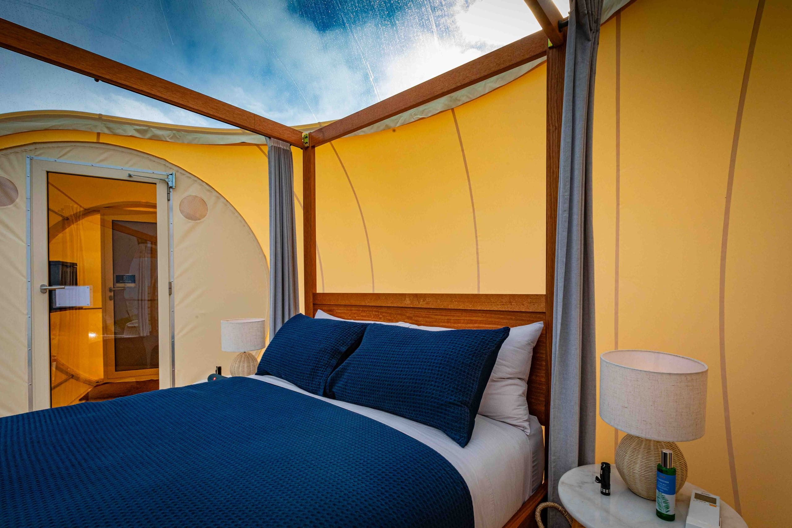 Rain shower beneath a circular skylight in the ensuite